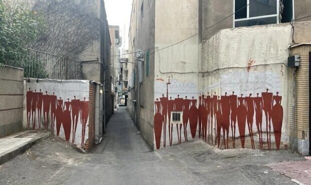 راز نقاشی‌های سرخ بر دیوار‌های تهران 